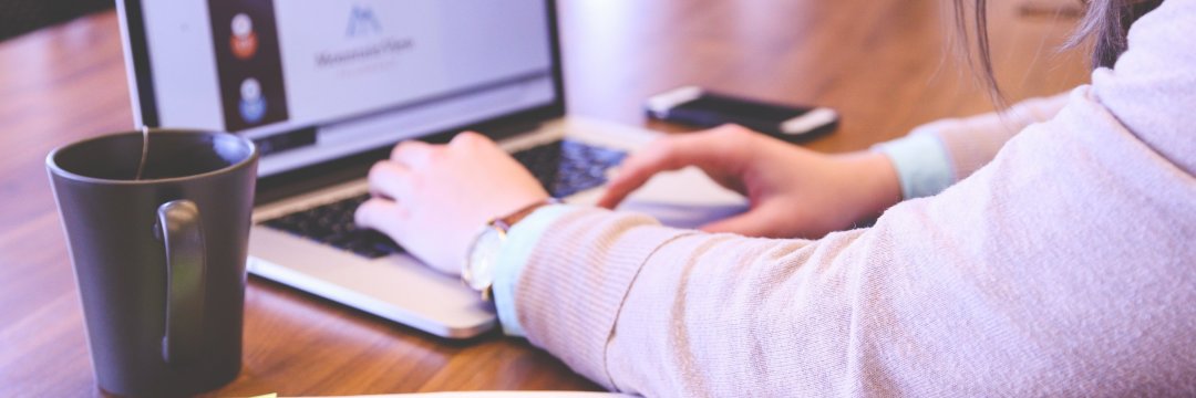Student working at a computer.