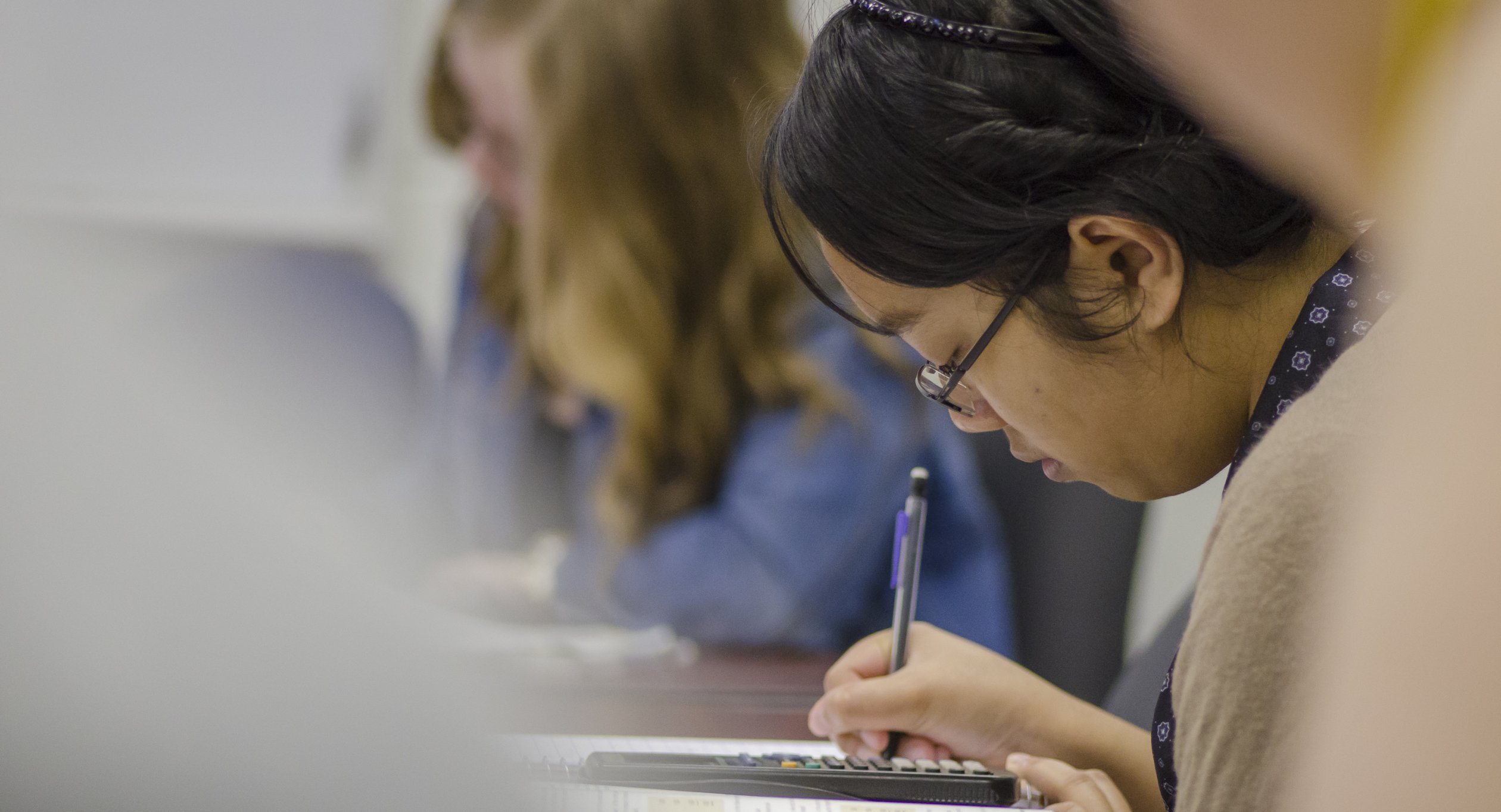 Accounting, Finances, Business - Student and Calculator