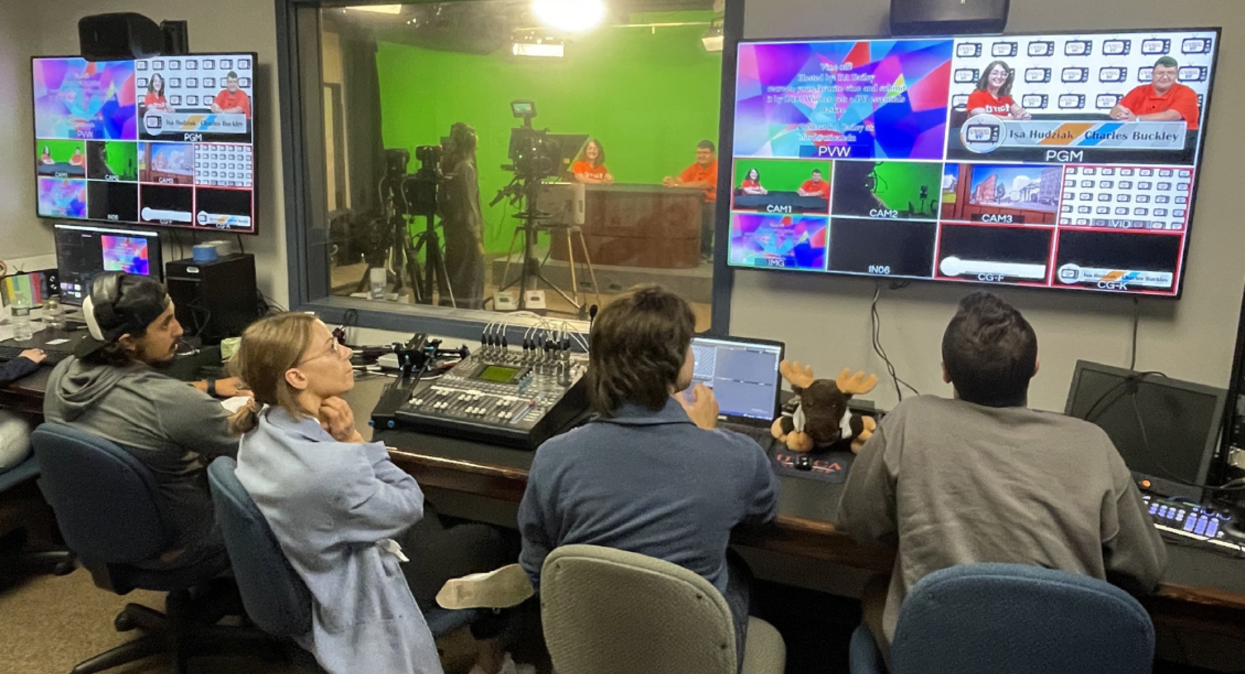 Students in control room producing a TV broadcast program.