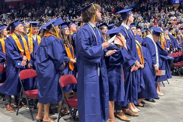 Class of 2025 Commencement Crowd in Caps and Gowns
