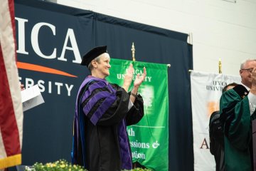 Provost Stephanie Nesbitt on the platform at 2025 Convocation.