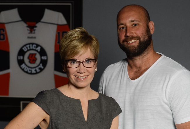 Utica College President Laura Casamento and Utica Comets President Robert Esche.